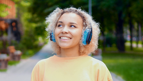 Girl with headphones listening to music