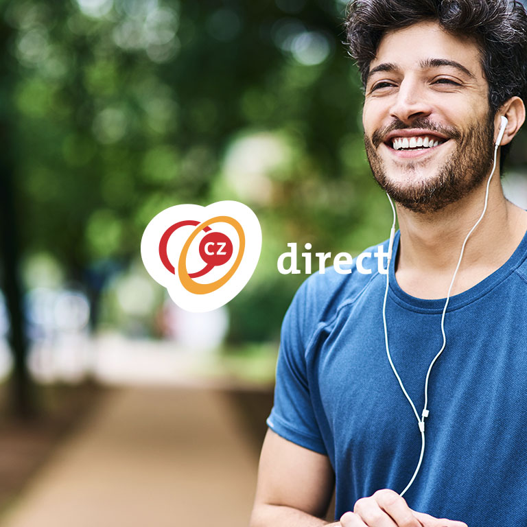 Man smiling and listening to music
